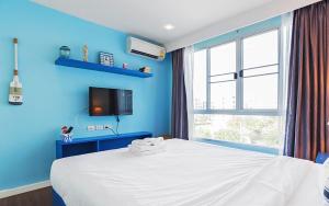 Postel nebo postele na pokoji v ubytování Baan Imm Aim Huahin sea view