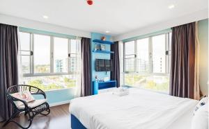 Postel nebo postele na pokoji v ubytování Baan Imm Aim Huahin sea view + 37 fotografií