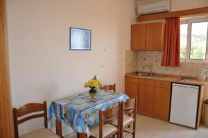 A kitchen or kitchenette at Summer Memories Aparthotel