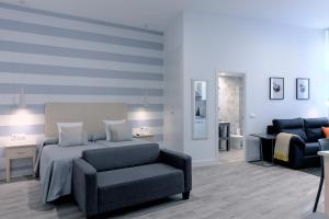 Posteľ alebo postele v izbe v ubytovaní Hotel Apartamentos MPD