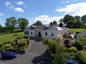 an aerial view of a house with a driveway at Willowbank House in Enniskillen