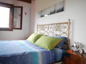Cama o camas de una habitación en B&B Via Punta 8