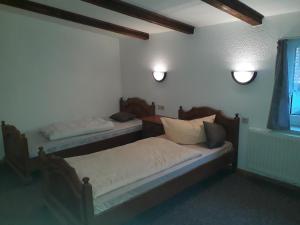 Postel nebo postele na pokoji v ubytování Richnow`s Bett und Bike ehem. Landgasthof