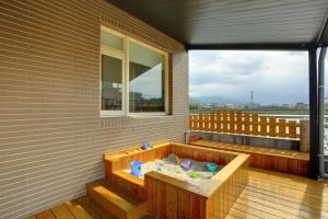 Un balcón o terraza en Playful Paradise