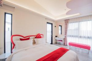 Letto o letti in una camera di Shangri Longluan Lake One B&B