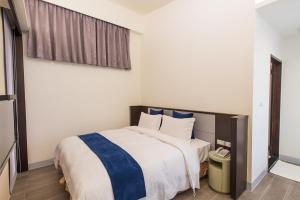 Letto o letti in una camera di Shangri Longluan Lake One B&B