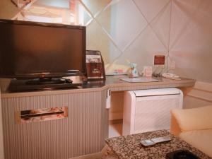 Kuchyň nebo kuchyňský kout v ubytování Hotel Elegance (Love Hotel)