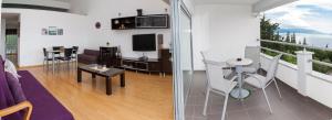 TV a/nebo společenská místnost v ubytování Apartments Vista