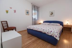 Postel nebo postele na pokoji v ubytování Apartments Vista