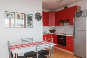 Kuchyň nebo kuchyňský kout v ubytování Apartments Vista