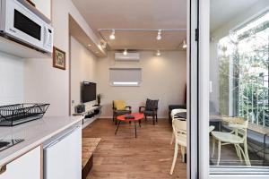 Kuchyň nebo kuchyňský kout v ubytování Hanasi 129 - Boutique Apartments