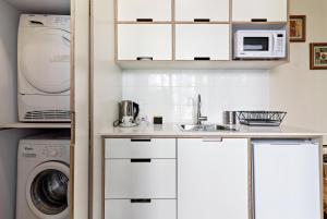 Kuchyň nebo kuchyňský kout v ubytování Hanasi 129 - Boutique Apartments