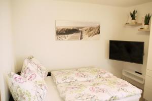 Postel nebo postele na pokoji v ubytování Apartments Fuchs