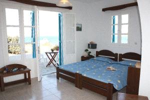A bed or beds in a room at Kolona Studios