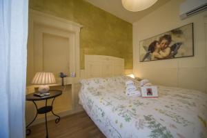 Postel nebo postele na pokoji v ubytování Albergo Etruria