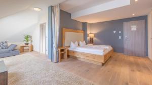 Postel nebo postele na pokoji v ubytování Heuboden Hotel Landhaus Blum