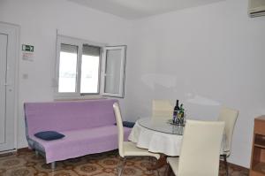 Posedenie v ubytovaní BM Apartments Rogoznica