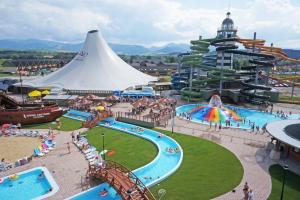 an amusement park with a slide and a water park at Apartment Jasna - Lucky in Belá