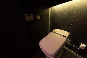 Um banheiro em Hotel Adlige