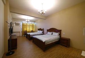 Letto o letti in una camera di Chi Chi B&B