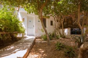Um jardim em L'Oasi Villaggio Albergo