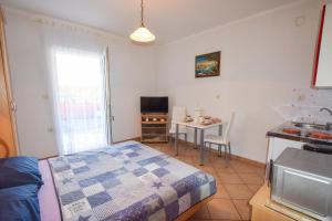 Kuchyň nebo kuchyňský kout v ubytování Apartments & Room Matic
