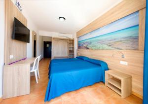 Łóżko lub łóżka w pokoju w obiekcie Hotel Anibal - AB Group