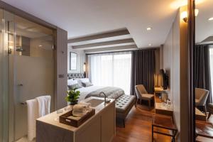 Katil atau katil-katil dalam bilik di Marine Beach Hotel Pattaya - SHA Plus