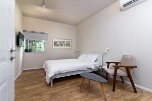 TV a/nebo společenská místnost v ubytování Hanasi 129 - Boutique Apartments