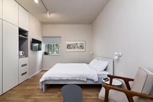 Postel nebo postele na pokoji v ubytování Hanasi 129 - Boutique Apartments