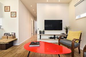 TV a/nebo společenská místnost v ubytování Hanasi 129 - Boutique Apartments