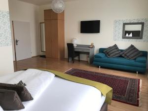 Postel nebo postele na pokoji v ubytování Hotel Bellini
