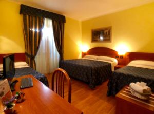 Posteľ alebo postele v izbe v ubytovaní Saint Peter Inn