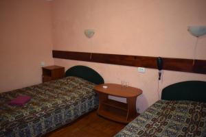 Ліжко або ліжка в номері Hotel Desna KUT