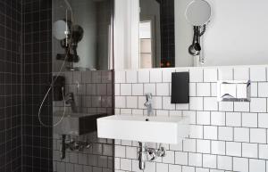 Koupelna v ubytování Comfort Hotel Karl Johan + 35 fotografií
