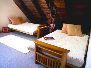 Posteľ alebo postele v izbe v ubytovaní Chalet Drevarska