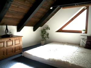 Posteľ alebo postele v izbe v ubytovaní Chalet Drevarska