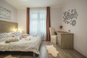 Postel nebo postele na pokoji v ubytování Holiday Center Ivona