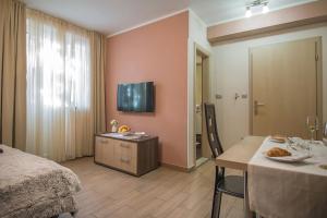 TV a/nebo společenská místnost v ubytování Holiday Center Ivona