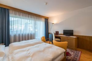 Postel nebo postele na pokoji v ubytování Hotel Hell