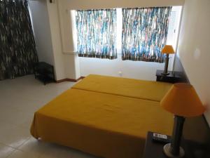 Łóżko lub łóżka w pokoju w obiekcie A Ponte Marques de Pombal