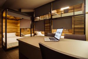 Posteľ alebo postele v izbe v ubytovaní Eco Hostel