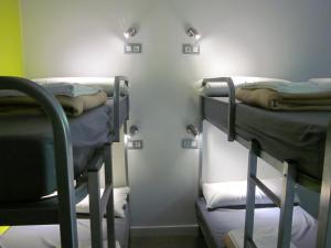 Postel nebo postele na pokoji v ubytování UBA Hostel