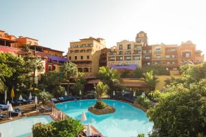 an overhead view of a resort with a large swimming pool at Europe Villa Cortes GL in Playa de las Americas