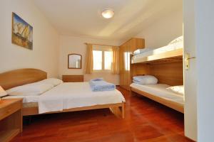 Postel nebo postele na pokoji v ubytování Villa Jurac + 37 fotografií