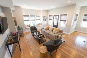 an overhead view of a living room with a couch at The Newport Lofts - 595 Thames Street in Newport