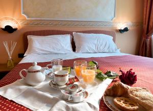 Postel nebo postele na pokoji v ubytování Hotel Bifi