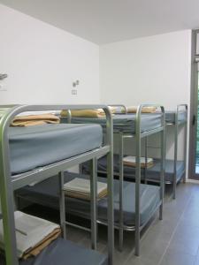 Postel nebo postele na pokoji v ubytování UBA Hostel