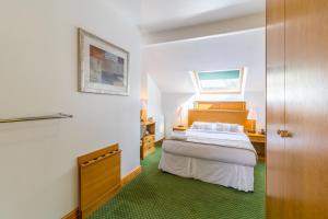 Ένα ή περισσότερα κρεβάτια σε δωμάτιο στο A Park View Hotel