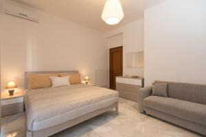 Posteľ alebo postele v izbe v ubytovaní Salerno e le due coste